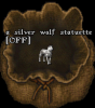 a siver wolf statuette.png